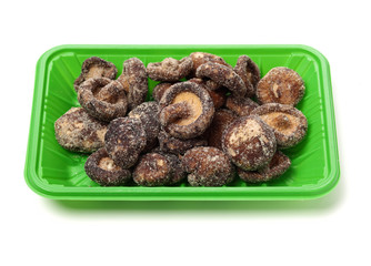 Dry Mushrooms isolated on white background. Selective focus