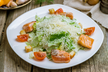 Caesar salad with salmon