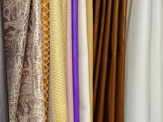 leather samples in brown, white, grey and violet colours
