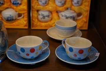 cup of tea and cookies on wooden background