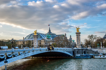 Obraz na płótnie Canvas Pont Alexandre III on Seine River with Grand Palais in background - Paris France