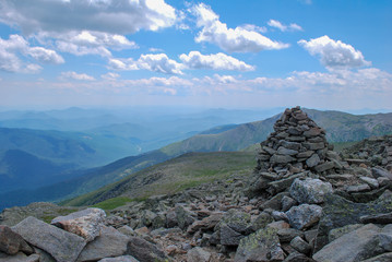 View of hiking Carine and Mountains in the Presidential Range from Mount Washington New Hampshire 