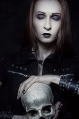 Heavy metal girl with skull