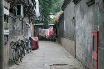 Bikes parked in a hutong, in a street of Beijing, China