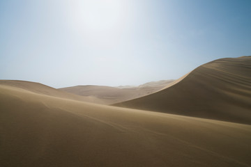 Fototapeta na wymiar Sand dunes landscape and waves of sand in the Gobi Desert in China, Gobi Desert, China
