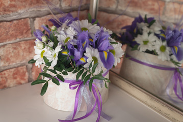 basket with flowers on a white background