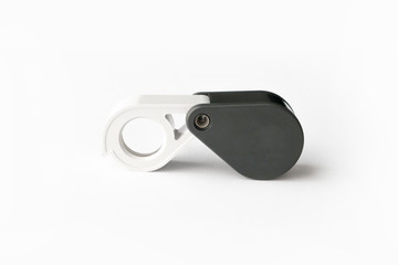 Magnifying glass for diamonds or see the amulet Isolated on a White Background.
