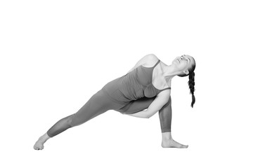 young girl performs different poses of yoga, flexible beautiful model on a white background. meditation and asanas.