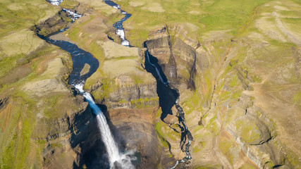 Aerial view shot of Haifoss Waterfall at summer in Iceland, Summertime	