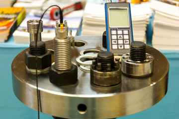 ultrasonic bolt load measurement (maintenance testing device) for industrial work - obrazy, fototapety, plakaty