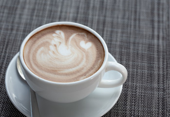 Close shots, hot coffee in a white cup