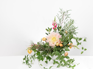 Wispy boho flower arrangement with dahlia and ranunculus
