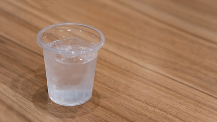 Plastic mug on the table