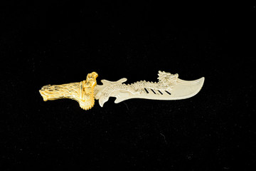 Close-up of toy sword knife