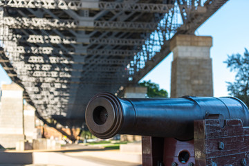 Historic cannon under Sydney Harbour Bridge. Military defence concept