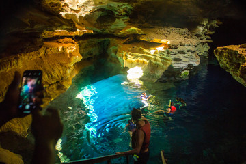 The blue well is one of the most popular tourist spots of the Chapada Diamantina, where it is possible to float in the crystal clear waters