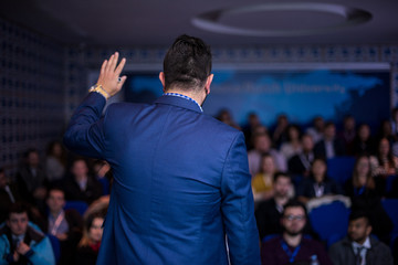 successful businessman giving presentations at conference room