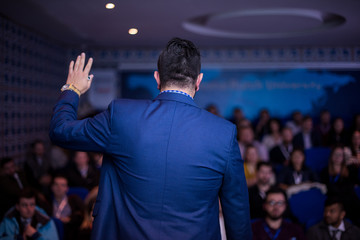 successful businessman giving presentations at conference room