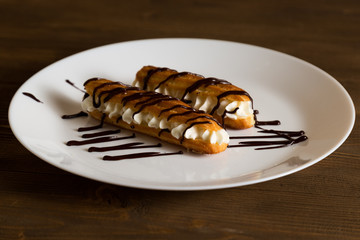 Eclairs with a delicate cream inside
