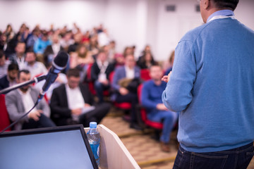 successful businessman giving presentations at conference room