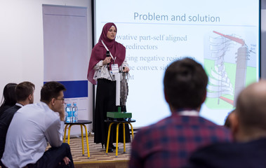 Muslim businesswoman giving presentations