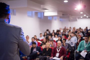 successful businessman giving presentations at conference room