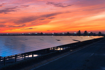 Photovoltaic solar power plant in the morning sunrise
