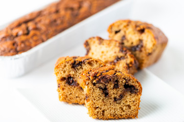 Delicious chocolate banana cake on white background. Selective focus