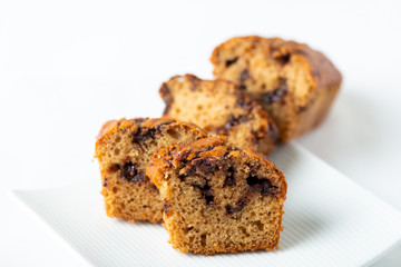 Delicious chocolate banana cake on white background. Selective focus