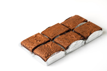 Close up sweet chocolate brownie on white background