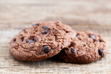 Chocolate chip cookies on wood table. Copy space for your text or image.