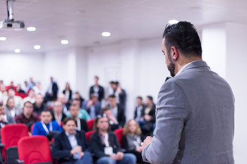 successful businessman giving presentations at conference room