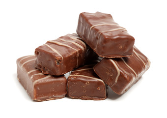 Chocolate peanut candy on white background