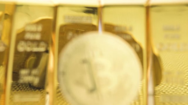 Zoom in slow motion shot of front bit coins