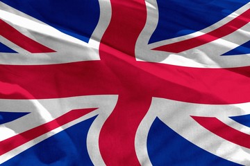 Waving United Kingdom (UK) flag for using as texture or background, the flag is fluttering on the wind