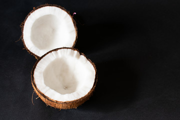 coconuts on a black background