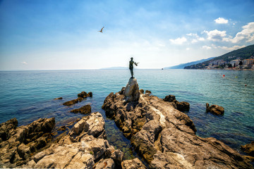 The historic statue of Maiden with the seagull is a symbol, not only of Opatija, but the entire Kvarner region. The statue on Adriatic coast is in the touristic town of Opatija in Croatia, Europe