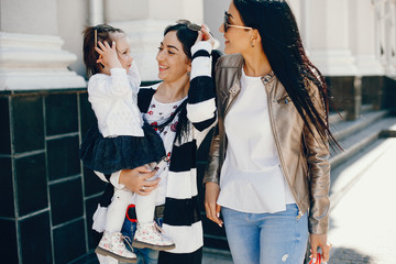 Family in a summer city