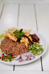 Thai shrimp paste fried rice with shallot, sweet barbeque pork, egg and vegetable
