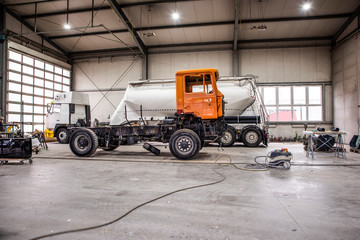 Paint shop and lighting in the large trucks and passenger cars are painted and also repaired