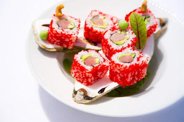 Sushi on a plate.