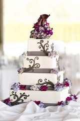 Elegant 4 tiered purple square wedding cake
