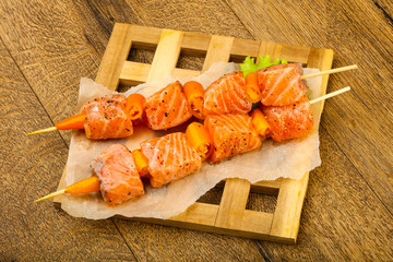 Raw salmon skewer
