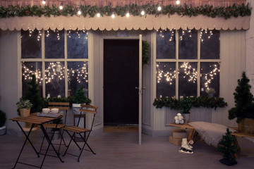 Winter. Street cafes. City, street, romantic date. Two cups of coffee, with a coffee. Coffee in a paper Cup. Wooden furniture in the cafe. Bench, vintage cafe.