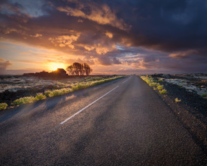 Empty road in south Iceland at sunset