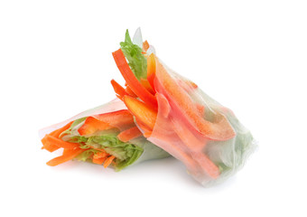 Tasty spring rolls on white background
