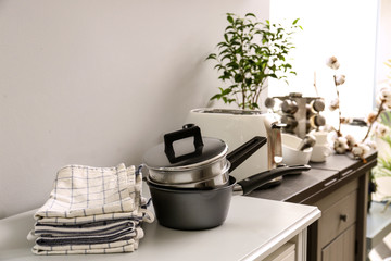 Set of kitchen utensils on table