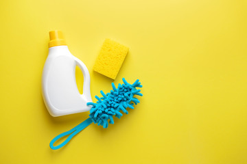 Set of cleaning supplies on color background
