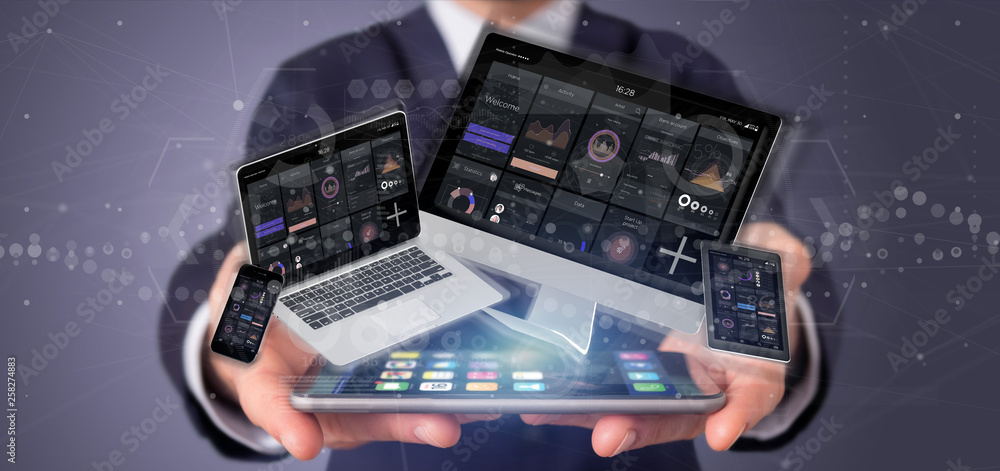 Poster businessman holding devices connected to a cloud multimedia network 3d rendering
