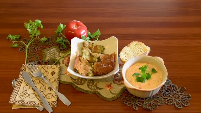 Healthy mediterranean cuisine, three dishes concept for lunch or dinner. Side view closeup of getting the letuce salad from the table